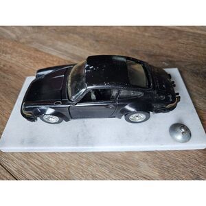 Vintage Porsche 911 Turbo 930 Diecast Model on White Marble Base - Black 1:24